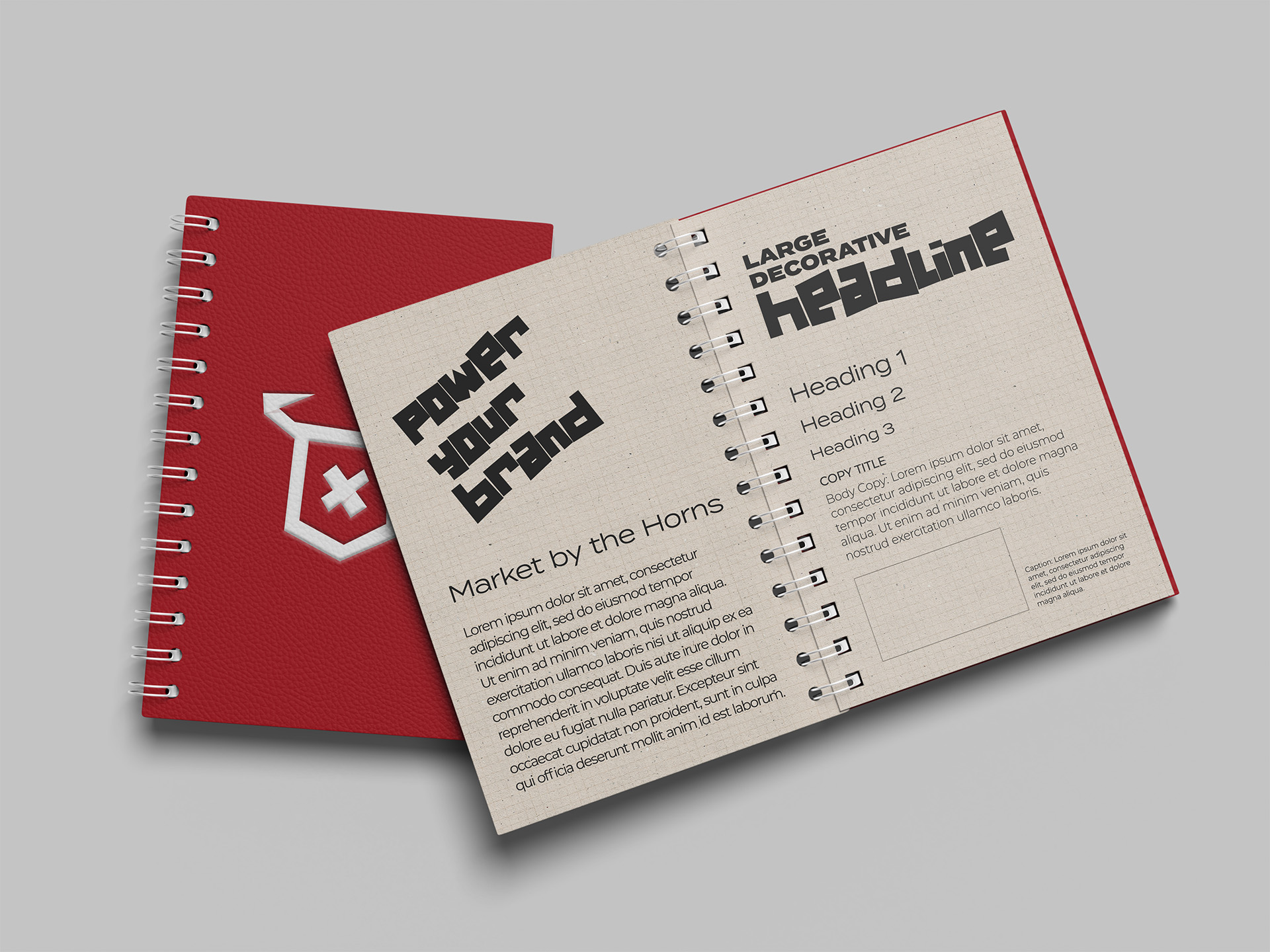 Ox Red Marketing brand typography shown in a spiral notebook style guide mockup, featuring the blocky 'Power Your Brand' headline and ox-head shield logo on the cover